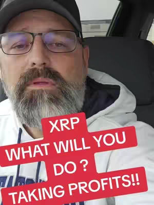 A man with glasses and a gray beard in a car setting, overlaid with a red and white text box. The overall composition is a medium close-up focusing on his face while in the vehicle.