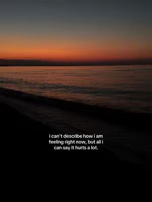 The image captures a tranquil scene at dusk, with the ocean merging into a vibrant sky. The sky transitions from orange to dark blue, reflecting on the water's surface. In the lower portion of the image, a dark foreground suggests a beach or shoreline, creating a silhouette against the illuminated sky. Text in white explains the feeling.