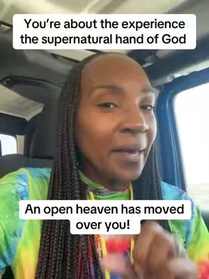 A woman is in the front seat of a car, speaking directly to the camera. Text overlays emphasize the experience with the supernatural hand of God.