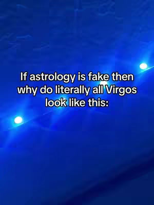 The image features a deep blue background with white text overlaid. The text asks, 'If astrology is fake then why do literally all Virgos look like this:' creating a question-and-answer format. There are hints of light sources or glows against the blue.