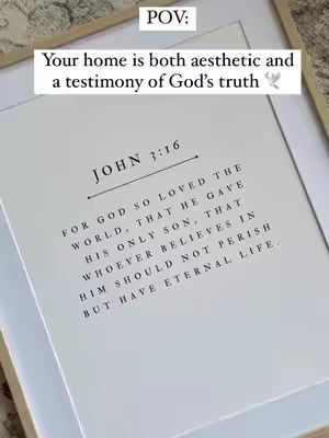 The cover image presents a framed print with a Bible verse on it. The text is centered, and the color palette is predominantly black and white. The image has a simple aesthetic with a frame.
