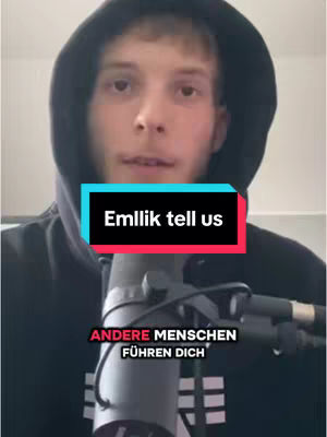 The cover image captures a young man in a hoodie. A rectangular text box in front of the main subject reads 'Emmllik tell us'. Below the text box, other text appears, though it is a bit cut off.