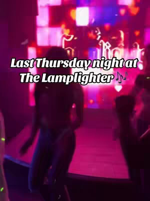 A vertical video cover image showing a person dancing in a night club. The background has a pink and purple light show. Text is overlayed.