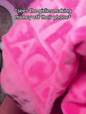 The image showcases a close-up of a pink object, possibly fabric with a pattern, with a text overlay visible on top.