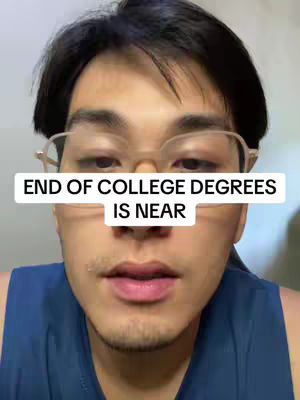 A close-up shot of a man with short, dark hair wearing eyeglasses. A text overlay covers his face and the background is blurred.