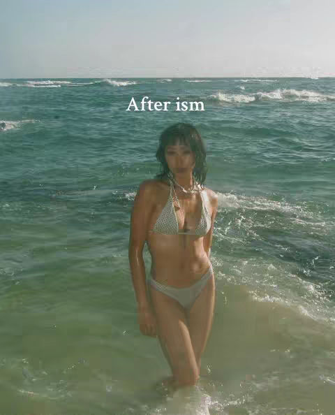 A woman stands in the ocean, waves around her, with text overlayed on the image.