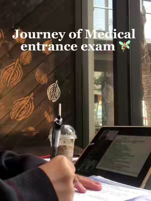 The cover image shows a person sitting in a cafe, working on a laptop. In the background, a wooden wall with leaf patterns and a glass window are visible. On the table is a laptop, a cup of coffee, and a pen. The overall impression is one of studying or working in a relaxed environment.
