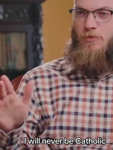 The cover image features a man with a beard and glasses, wearing a checked shirt. The hook text is at the bottom of the image.