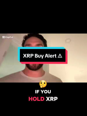 A man in a grey t-shirt is centered in the frame, with a teal and red text overlay that says 'XRP Buy Alert'. Below this, a yellow thinking face emoji is above the text 'IF YOU HOLD XRP' in white and red.