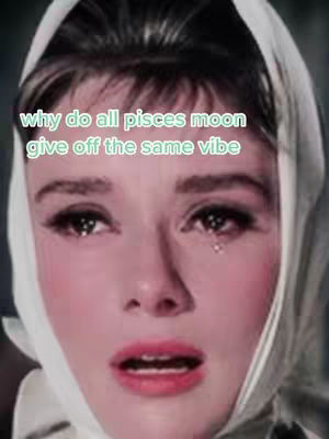 Close-up of a woman's face with tears streaming down her cheeks. She is wearing a headdress, and the image has a vintage, slightly desaturated look. Text overlayed on the image asks 'why do all pisces moon give off the same vibe'.