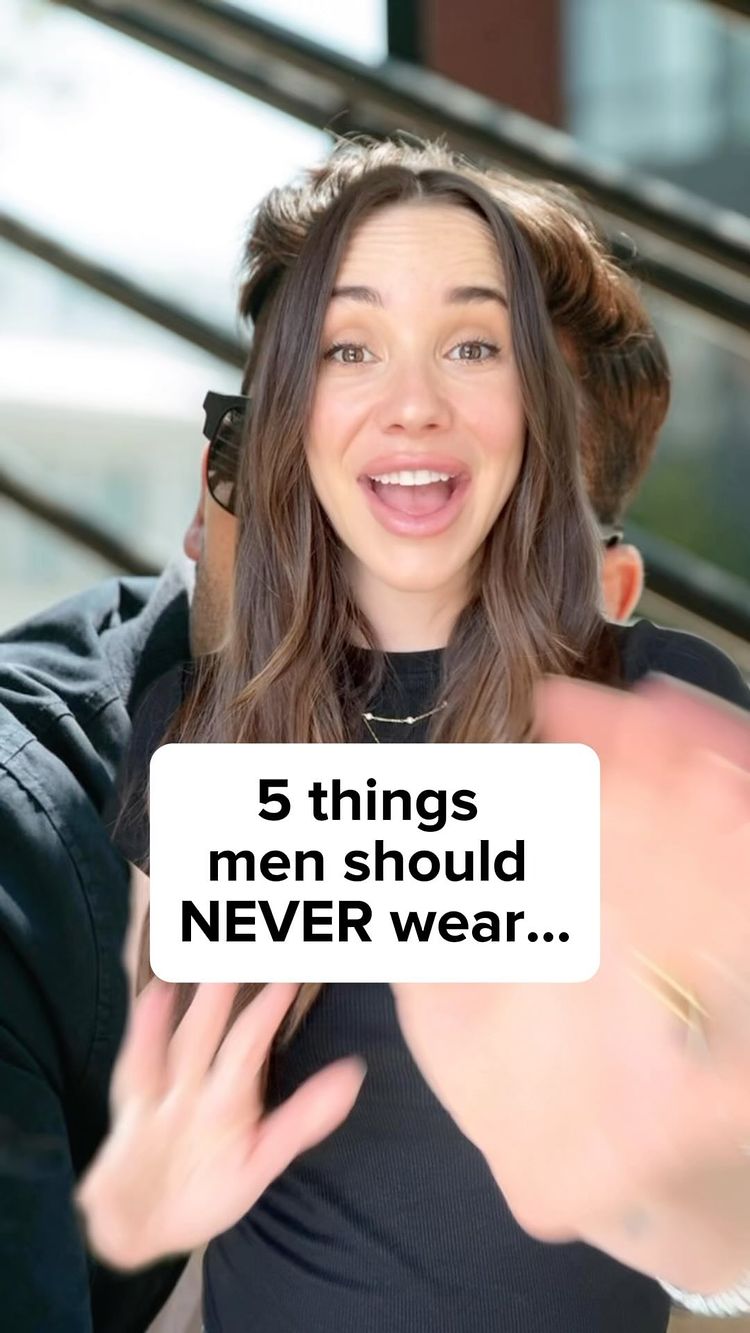 The cover image features a woman with long brown hair, her mouth open in an excited expression. A man’s shoulder and sunglasses are blurred in the background. A white rectangular text overlay at the bottom says: “5 things men should NEVER wear…”. The background suggests a well-lit, possibly outdoor, setting.