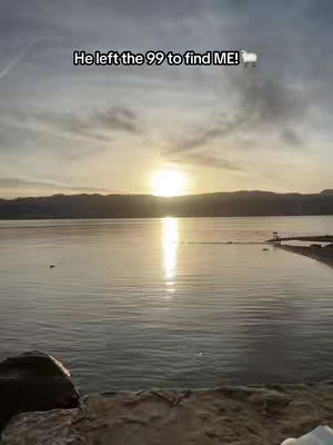A serene landscape with water reflecting the sky and a bright sun. The text overlay reads, 'He left the 99 to find ME!'