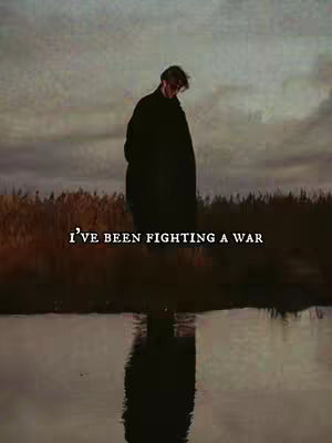The cover image features a person standing in a field near water, reflecting a somber mood. The person, silhouetted in dark clothing, is facing away from the viewer, with their head bowed, in a field with some grass. The sky is filled with a range of muted colors, with clouds suggesting a melancholic atmosphere, and reflected in the water below the silhouette of the lonely figure in the middle.