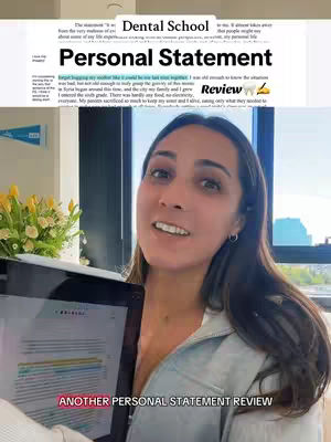 A woman smiles directly at the camera while holding a tablet displaying a document. The image is a selfie with a bright, well-lit environment, suggesting a professional or academic setting. Behind her, a partial view suggests a room with a window or a bright outdoor scene. The bottom of the image has an overlayed text.