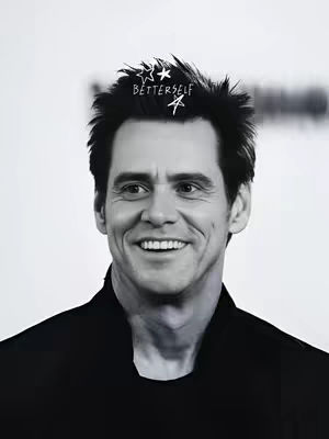 A black and white portrait of Jim Carrey smiling, with a simple background and a hand-drawn text overlay.