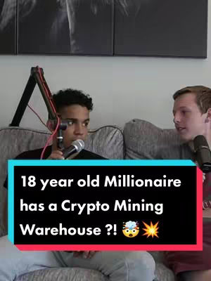 The cover image shows two young men seated on a gray sofa. A text overlay sits at the bottom of the frame against a dark blue background. The overlay reads, "18 year old Millionaire has a Crypto Mining Warehouse ?! 🤯💥". The man on the left holds a microphone and speaks, while the man on the right appears to listen. The background is simple, with a black square art piece above the couch.