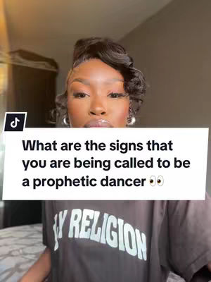 The cover image features a close-up of a Black woman with styled hair and makeup, looking directly at the camera. A text box at the bottom reads, 'What are the signs that you are being called to be a prophetic dancer?'. The woman is wearing a dark shirt with text on it.