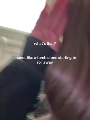 The cover image is blurry and shows a person's view from the inside of a room. The background has glimpses of what looks like pink color. The primary focus is on the text overlays.