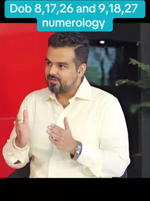 A man is centered in a medium shot, speaking with his hands. Text overlay at the top of the image.