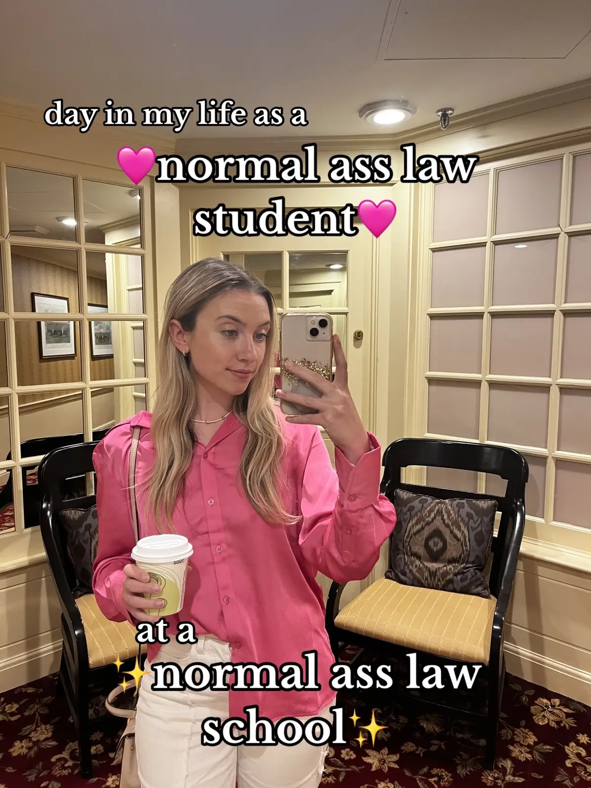 A woman with long blonde hair takes a selfie in what appears to be a hotel or well-appointed room; she is wearing a pink button-down shirt and white pants, holding a coffee cup. The background includes mirrors, windows, and black chairs. Text overlays describe her as a normal law student.