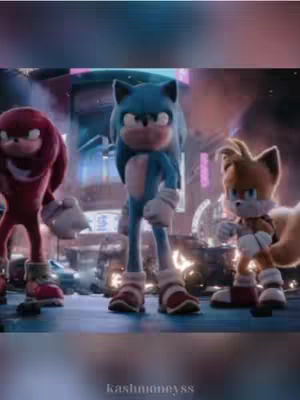 The cover image showcases three animated characters from the Sonic the Hedgehog franchise, positioned in a dimly lit, futuristic setting. Sonic, in the center, is flanked by Knuckles on the left and Tails on the right. The characters are rendered in detail with vibrant colors and dynamic poses.