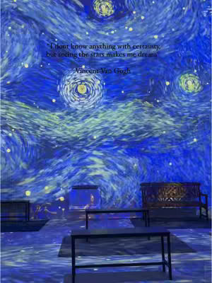 The image showcases an immersive art installation of Van Gogh's 'Starry Night,' with people seated on benches. The artwork dominates the background, with swirling blues, greens, and yellows forming the night sky. In the foreground, there are some benches, giving a sense of the space as a venue. Quote from Van Gogh is superimposed on the image.