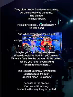 The image features a dark interior with a large screen in the background displaying what appears to be an abstract image. In the lower area, there are blurred figures of people. The image has white text overlaid on it, with multiple lines of text appearing to tell a story. The lighting is diffused, with a focus on the screen’s display.