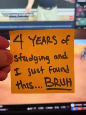 A hand holds a yellow sticky note in front of various screens. The note has handwritten text in black ink saying: "4 YEARS of studying and I just found this... BRUH" with the word "BRUH" underlined. The background shows a person behind a computer screen, as well as two additional computer screens.