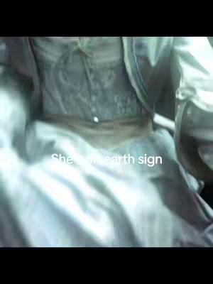 The image is a close-up shot of a person (likely a woman) in clothing, the image quality is blurred. White text is overlaid across the bottom.