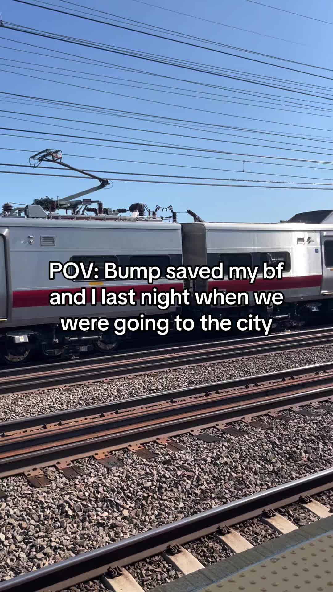 A train is shown traveling on tracks on a sunny day. Text overlayed on the image reads "POV: Bump saved my bf and I last night when we were going to the city"