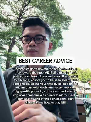 The cover image features a man with glasses in front of an out-of-focus, green-hued background, likely a tree or foliage. Text overlaid at the bottom says 'BEST CAREER ADVICE', accompanied by text explaining corporate dynamics. The man is centered and appears to be looking directly at the viewer, positioned near a laptop.
