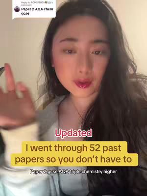A young woman with long dark hair is centered in the frame, looking directly at the camera. She is wearing a light-colored top. A text overlay in a yellow box reads, I went through 52 past papers so you don't have to.