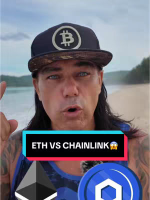 A man with long dark hair and a black baseball cap is positioned center-frame, looking directly at the camera. The background is a beach with a body of water and a cloudy sky. A text overlay is placed at the bottom mid of the frame.