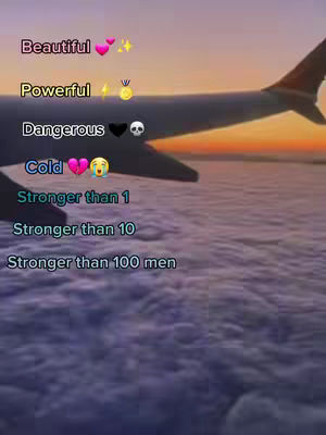 An image of an airplane wing is shown with a sunset and clouds. Overlayed on the image is text, emojis, and emoticons categorizing things as Beautiful, Powerful, Dangerous, and Cold.