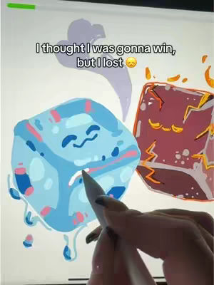 The cover image shows an iPad screen displaying a digital art game. Two cubic shapes with animated faces are in the foreground, one light blue with pink accents, the other brown with yellow accents. A hand holding a stylus hovers near the blue cube. Above, a text overlay reads, "I thought I was gonna win, but I lost 😔".