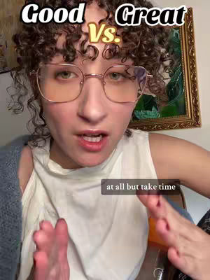 A woman with curly brown hair and glasses looks directly at the camera with her mouth slightly open. The words 'Good' and 'Great' are written above her head on either side of a 'Vs.' symbol. A text overlay at the bottom reads 'at all but take time.' The background includes a framed picture.