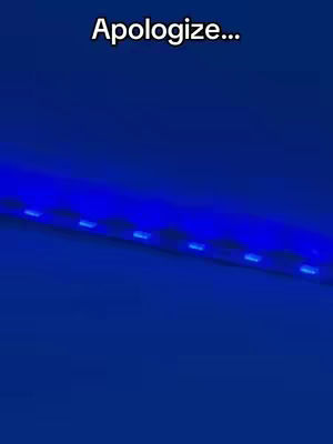 The cover image features a stark, minimalist aesthetic. It is dominated by a deep blue background. At the top of the image, there is a text overlay "Apologize..." in white, center-aligned. A line of small, bright lights illuminates a dark blue band across the image, suggesting stylized technology or a futuristic element.