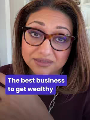 A woman with brown hair and glasses is close to the camera, with a purple rectangular text box that says "The best business to get wealthy"