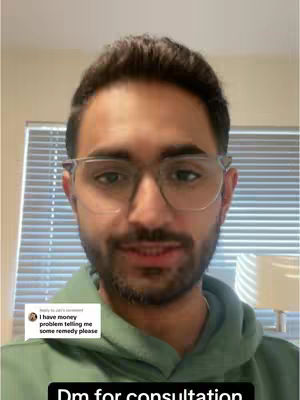A man wearing glasses and a green hoodie is the central figure, with a background of blinds and a lamp. A comment appears in the lower left corner. Text at the bottom reads, 'Dm for consultation.'