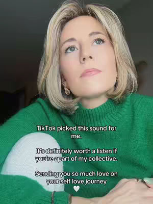 A woman with blonde hair looks upwards with a thoughtful expression, wearing a green sweater. Text overlays are placed over a pale, textured background.