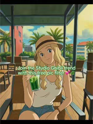 The cover image is a vibrant anime-style illustration. A young woman with blonde hair wearing a sun hat and casual clothing is seated in a terrace setting, holding a green beverage. The background features buildings, palm trees, and a bright sky, reminiscent of a tropical location. The text overlay highlights the Studio Ghibli theme.