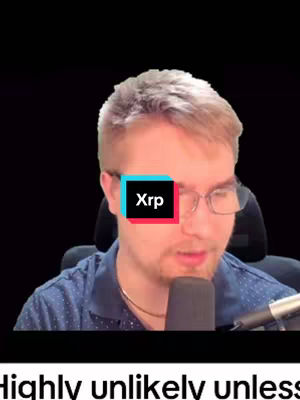 A man with glasses and a blue shirt is centered in a vertical frame. A colored box covers his eyes with the text 'Xrp'. The background is black, and a microphone juts up from below.