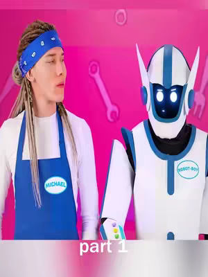 The cover image features a man with blonde dreadlocks and a blue bandana, wearing a white shirt and a blue apron with the name "MICHAEL" on it, standing beside a robot dressed in a white and blue suit. The background is a solid pink color with grey tool and wrench shapes. The text "part 1" is at the bottom in white.