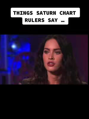 The cover image features a woman, Megan Fox, with dark hair and red lipstick, looking slightly to the side. Text overlayed at the top states 'Things Saturn Chart Rulers Say...' The background is blurred, with hints of blue lighting creating a studio setting.