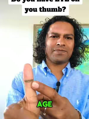 A man with dark curly hair in a blue shirt is holding up his thumb, which has a dark line across the top. The text on the image says, 'Do you have EYE on your thumb?' and 'AGE' in a green box at the bottom. The background is a blurry indoor setting with a framed picture.