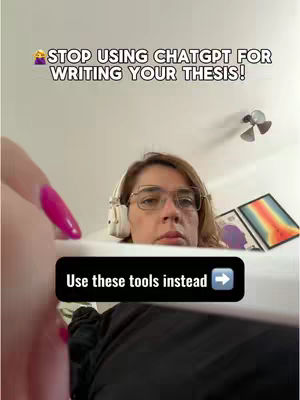 An overhead shot of a person looking down with a serious expression, wearing glasses and headphones, with text overlays. A hand with bright pink nail polish is visible in the bottom left corner.
