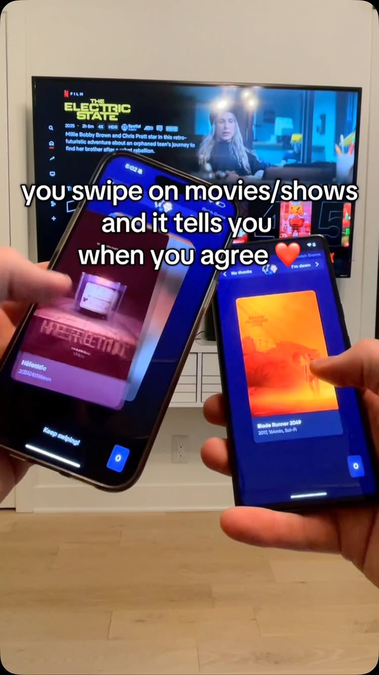 The cover image shows two smartphones held in hands, with some text overlayed on a background of a television screen showing a movie playing. The phones are angled toward the viewer, demonstrating the interaction between two people using an app to select movies or shows. The left phone displays a movie poster with a blurred background, the right phone displays a poster with a burning sky.