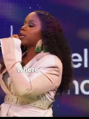 The cover image showcases a woman speaking into a microphone on a stage. She is wearing a light-colored blazer, with the text overlayed at the bottom that reads 'where'.