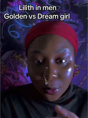 The cover features a close-up shot of a person with dark skin, wearing a red head covering and a dark turtleneck. The person has multiple piercings on their nose and is looking at the camera. Overlayed text at the top reads "Lilith in men Golden vs Dream girl". The background appears to be a mix of purples and blues with some out-of-focus designs.