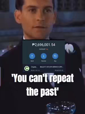 The cover image features a man in a suit from the waist up, with a blurry background. Overlaid on the image is a simulated cryptocurrency wallet display showing a balance of PHP 2,696,001.54 and a text overlay that reads "You can't repeat the past".  The overall composition uses a dark color palette to convey a sense of seriousness.